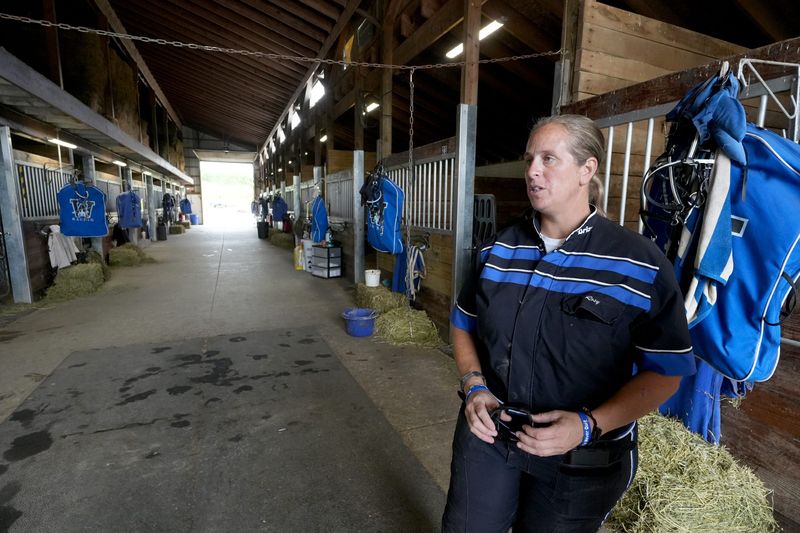 Rosy Weaver, a trainer, racer and owner of Standardbred Horses Weaver Racing at Glory Meadows farm in Sugar Creek Township, talks about her operation.