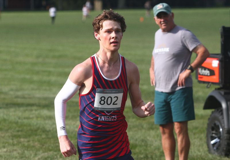 Fairfield Christian's Jordan McQueary races to the finish during the Newark Catholic Invitational at Bryn Du Mansion in Granville on Aug. 23, 2025.
