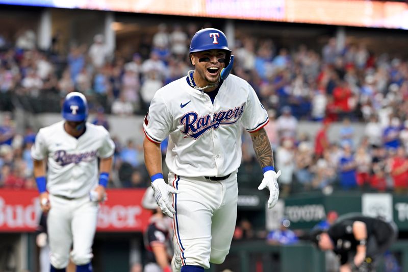Texas Rangers' Cody Freeman celebrates after he hit his first career MLB home run during a game against the Cleveland Guardians on Aug. 23, 2025, in Arlington, Texas.
