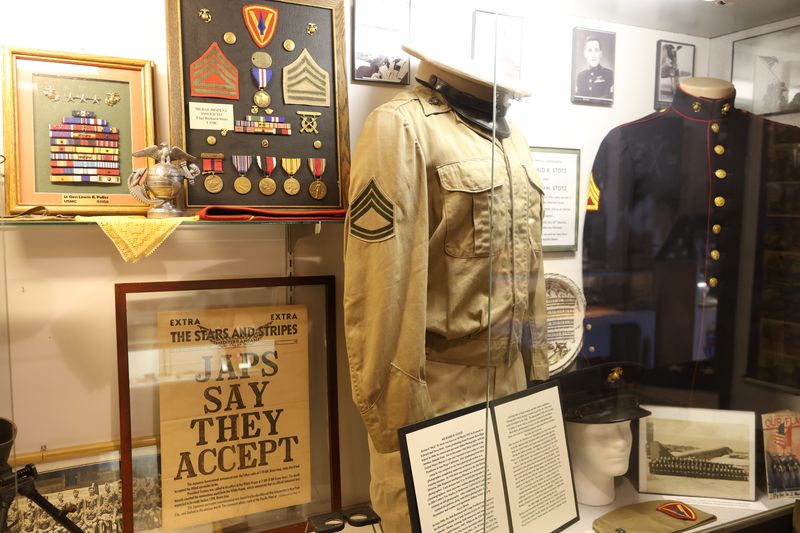The uniforms of brothers Donald and Richard Stotz, who served at Iwo Jima, are in the Northcoast Veterans Museum in Gibsonburg. They were military photographers from Fremont; the issue of "Stars and Stripes" reports the Japanese WWII surrender.