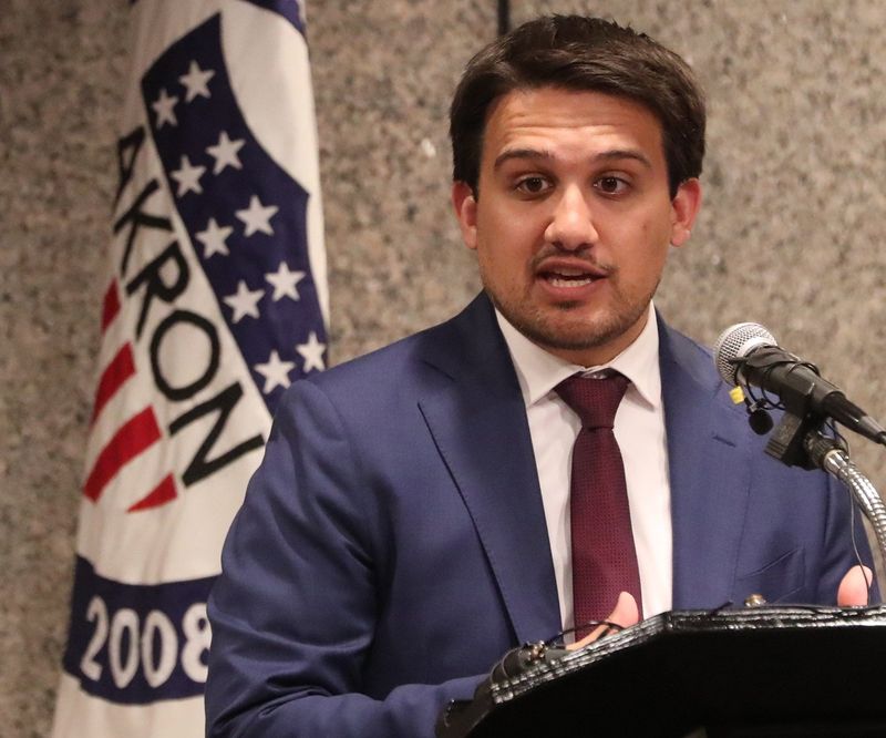 Akron Mayor Shammas Malik answers a question during a press conference Monday, where he announced a new fund to assist victims of gun violence.
