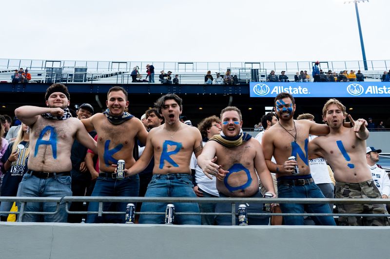 Akron Zips football student-fans cheer before the game against Wyoming, Aug. 28, 2025, at InfoCision Stadium in Akron, Ohio.