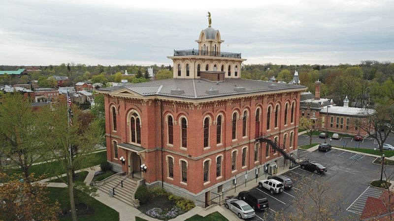The Delaware County Courthouse, 91 N. Sandusky St., is a two-story Italianate building topped by an elaborate statue of Lady Justice. Today the courthouse houses the County Commissioners and other personnel. (Columbus Dispatch photo by Doral Chenoweth III)