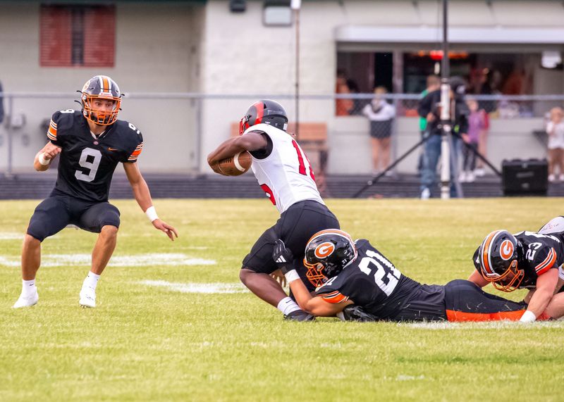 Gibsonburg's Luke Foster makes a tackle for a loss.