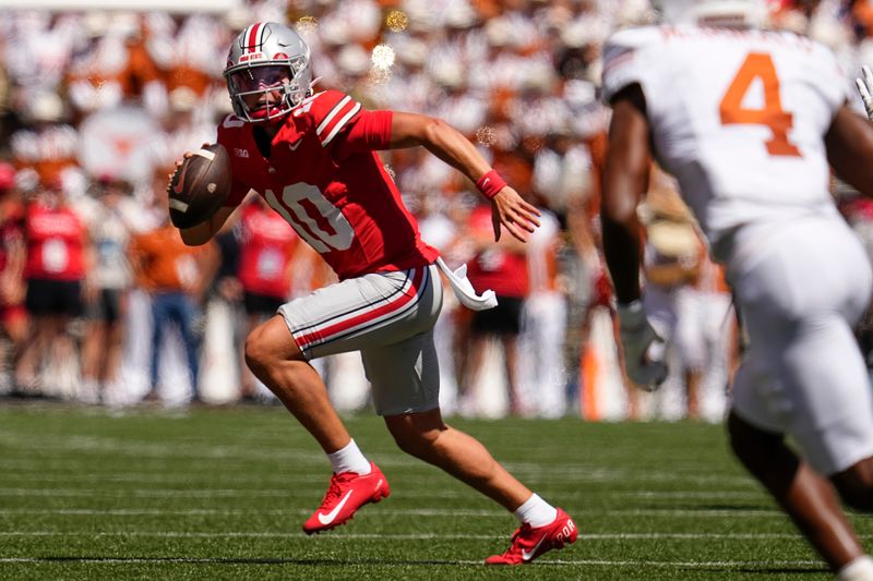 Ohio State Buckeyes quarterback Julian Sayin (10) runs during the first half of the NCAA football game against the Texas Longhorns at Ohio Stadium on Aug. 30, 2025.