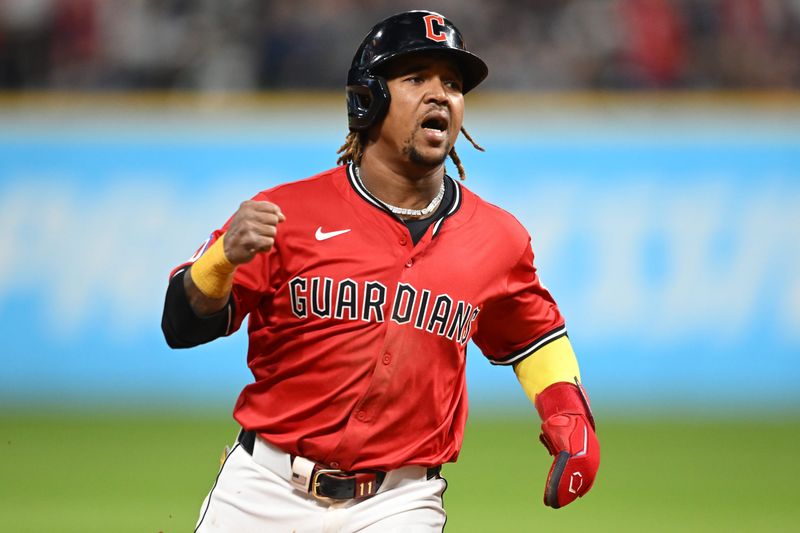 Aug 30, 2025; Cleveland, Ohio, USA; Cleveland Guardians third baseman Jose Ramirez (11) reacts while rounding the bases on a home run hit by first baseman Kyle Manzardo (9) against the Seattle Mariners during the sixth inning at Progressive Field. Mandatory Credit: Ken Blaze-Imagn Images
