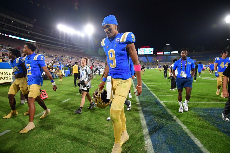 Aug 30, 2025; Pasadena, California, USA; UCLA Bruins quarterback Nico Iamaleava (9) following the loss against the Utah Utes during the second half at Rose Bowl. Mandatory Credit: Gary A. Vasquez-Imagn Images