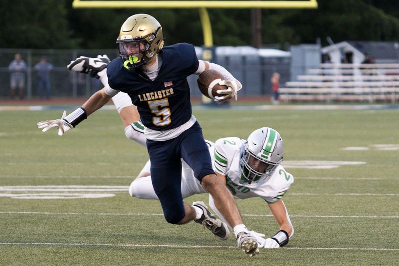 Lancaster's Kaleb Santiny looks for running room after receiving a catch against Dublin Scioto in a 41-40 Week 2 loss at Fulton Field.
