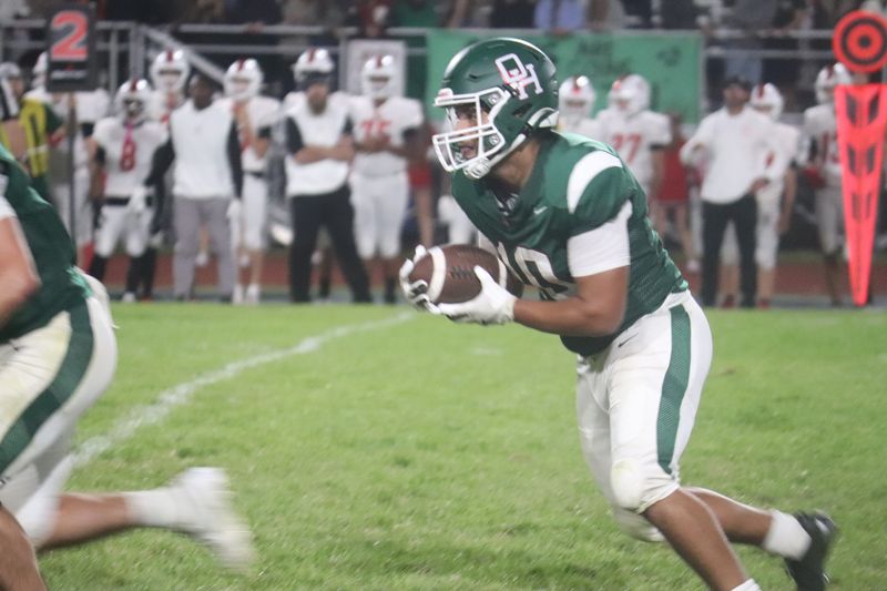 Oak Harbor's Travis Bouyer takes a look.