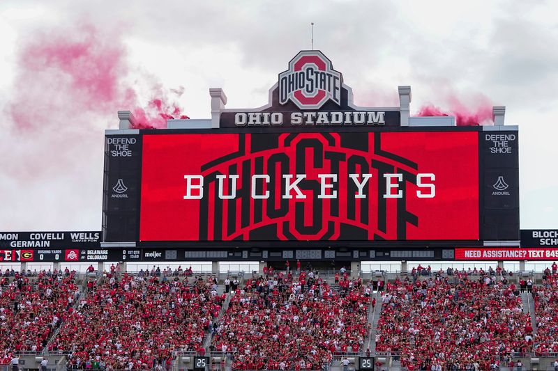 Red smoke rises from the scoreboard during Ohio State football's 2025 game against Grambling State on Sept. 6.