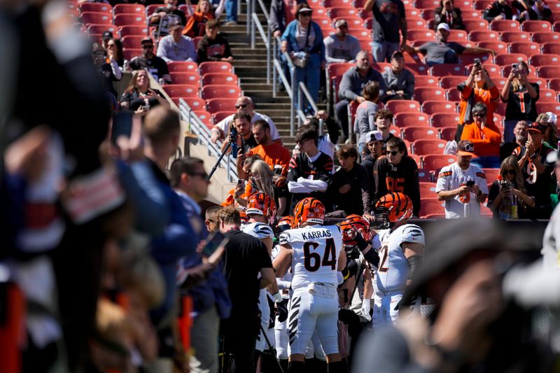 The Cincinnati Bengals offensive line prepares to take the field during warmups before the NFL Week 1 game between the Cleveland Browns and the Cincinnati Bengals at Huntington Bank Field in Cleveland on Sunday, Sept. 7, 2025.
