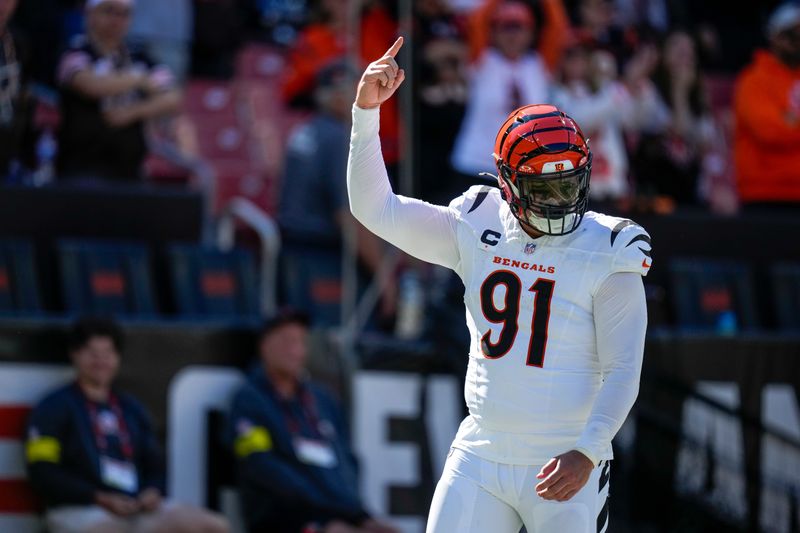 Cincinnati Bengals defensive end Trey Hendrickson (91) celebrates as time winds down in the fourth quarter of the NFL Week 1 game between the Cleveland Browns and the Cincinnati Bengals at Huntington Bank Field in Cleveland on Sunday, Sept. 7, 2025. The Bengals begin the season with a 17-16 win over the Browns.