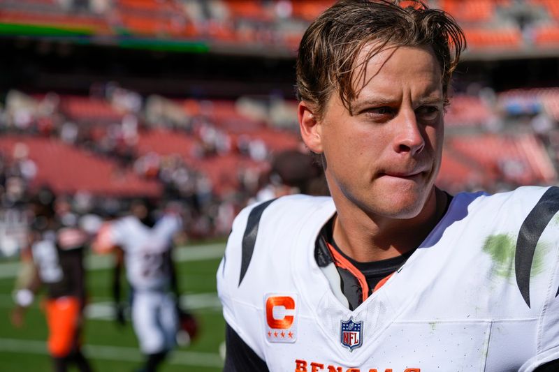 Cincinnati Bengals quarterback Joe Burrow (9) shakes hands after the fourth quarter of the NFL Week 1 game between the Cleveland Browns and the Cincinnati Bengals at Huntington Bank Field in Cleveland on Sunday, Sept. 7, 2025. The Bengals begin the season with a 17-16 win over the Browns.