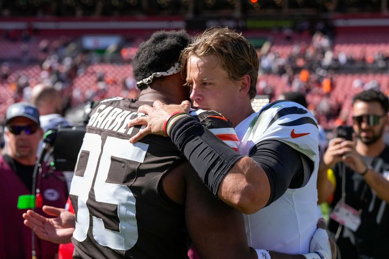 Cleveland Browns defensive end Myles Garrett and Cincinnati Bengals quarterback Joe Burrow embrace after their meeting in September.