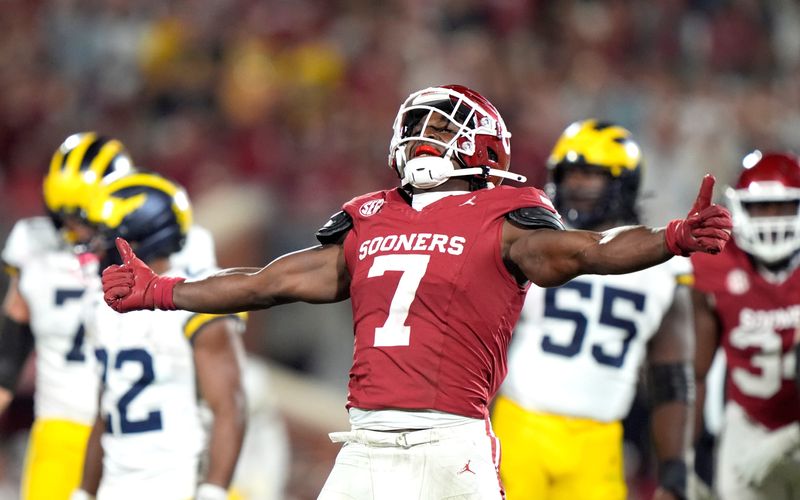 Oklahoma's Sammy Omosigho (7) celebrates a play in the second half of the college football game between the University of Oklahoma Sooner and the University of Michigan Wolverines at the Gaylord Family Ã Oklahoma Memorial Stadium in Norman, Okla., Saturday, Sept. 6, 2025.