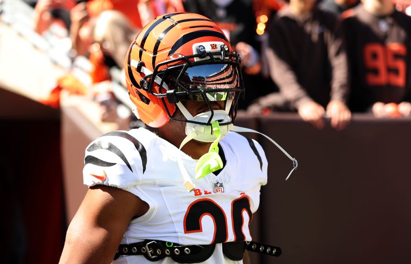 Sep 7, 2025; Cleveland, Ohio, USA; Cincinnati Bengals cornerback DJ Turner II (20) warms up before a game against the Cleveland Browns at Huntington Bank Field. Mandatory Credit: Scott Galvin-Imagn Images