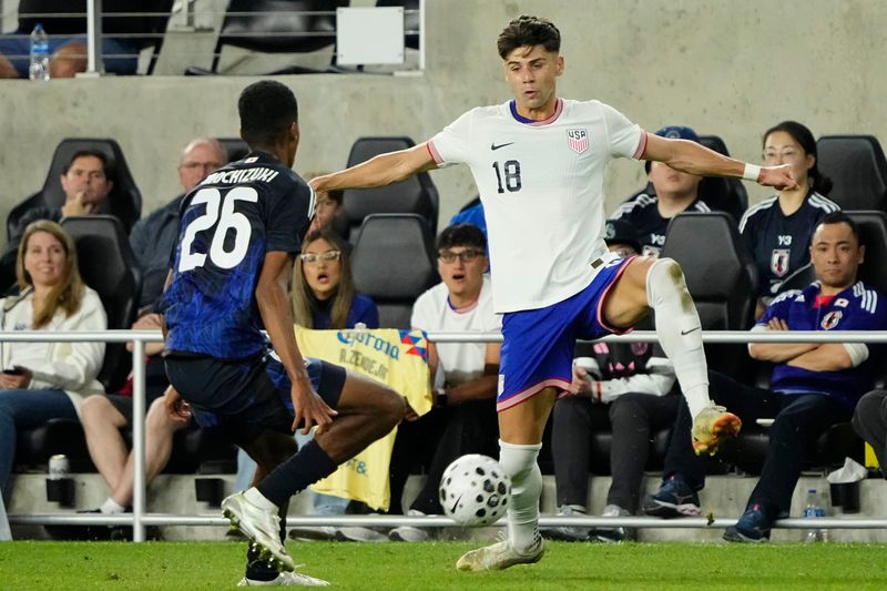 United States defender Max Arfsten dribbles past Henry Heroki Mochizuki of Japan during an international friendly in Columbus on Sept. 9, 2025. The U.S. won 2-0.