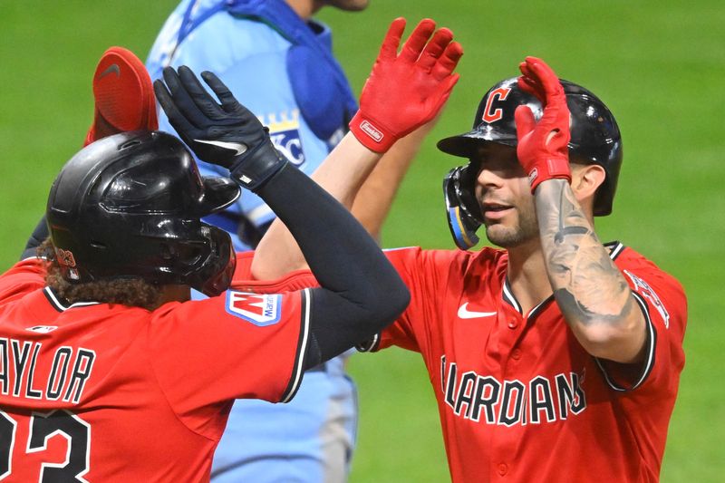 Cleveland Guardians' CJ Kayfus, right, celebrates his two-run home run with teammate Bo Naylor (23) in the eighth inning against the Kansas City Royals on Sept. 11, 2025, in Cleveland.