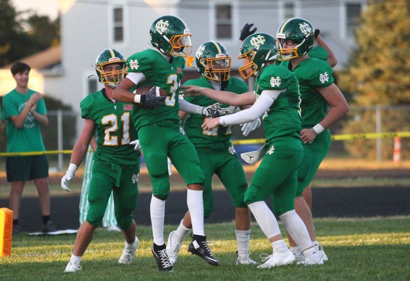 Newark Catholic's Kyler Dales (3) celebrates his TD catch during the Green Wave's 21-20 loss to visiting Worthington Christian on Sept. 12, 2025.