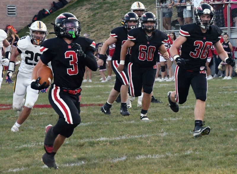 Rittman's Odin Weirick breaks into the open for Rittman's first touchdown.