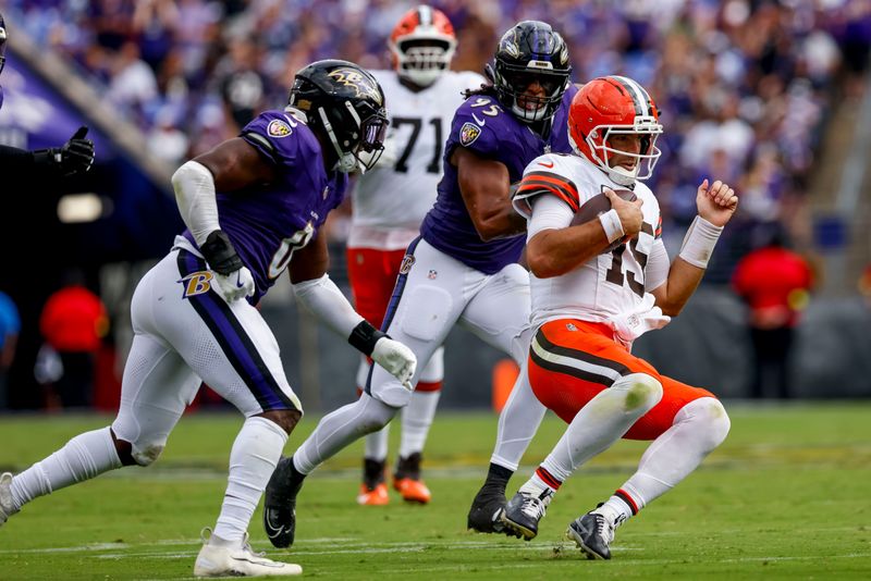 Cleveland Browns quarterback Joe Flacco (15) slides after a scramble against the Baltimore Ravens on Sept. 14, 2025, in Baltimore, Maryland.