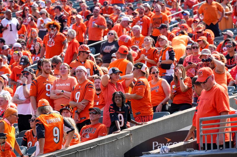 Cincinnati Bengals fans wear orange for the home opener in the first quarter of the NFL Week 2 game between the Cincinnati Bengals and the Jacksonville Jaguars at Paycor Stadium in downtown Cincinnati on Sunday, Sept. 14, 2025. The Jaguars led 17-10 at halftime.