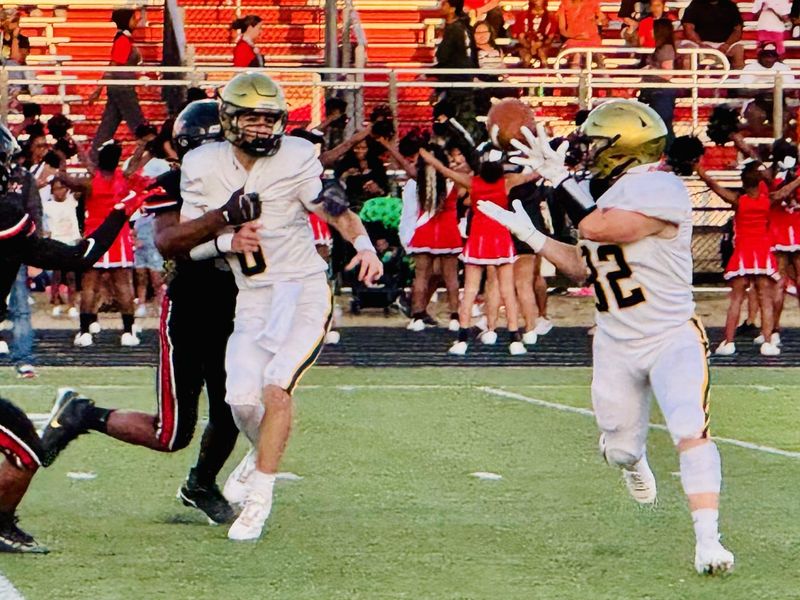 Lancaster junior quarterback Brody Broeckel pitches the ball to Jackson Utt during the Golde Gales' 35-14 Ohio Capital Conference-Buckeye Division loss against Groveport Sept. 19., 2025.
