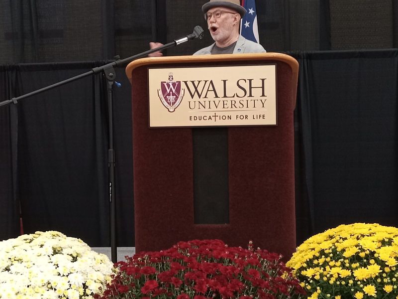 Human trafficking expert Tony Talbott tells an audience at Walsh University on Sept. 20 that reducing the demand for commercial sex and exploited labor can disrupt human trafficking.