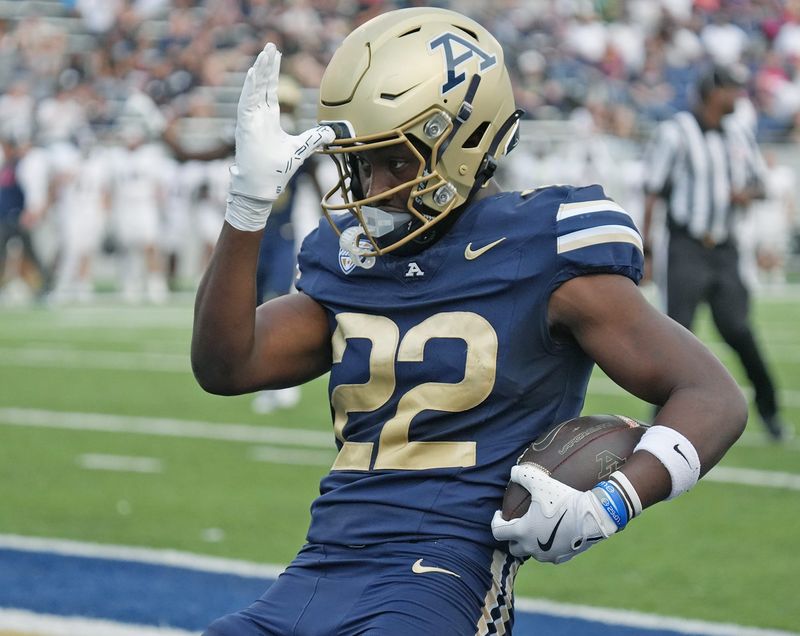 Akron Zips running back Jordan Gant celebrates his touchdown against Duquesne during the first half Sept. 20, 2025.