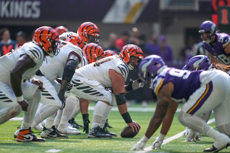 Cincinnati Bengals center Ted Karras (64) waits to snap the ball in the fourth quarter of the NFL Week 3 game between the Minnesota Vikings and the Cincinnati Bengals at U.S. Bank Stadium in Minneapolis on Sunday, Sept. 21, 2025. The Vikings won, 48-10.