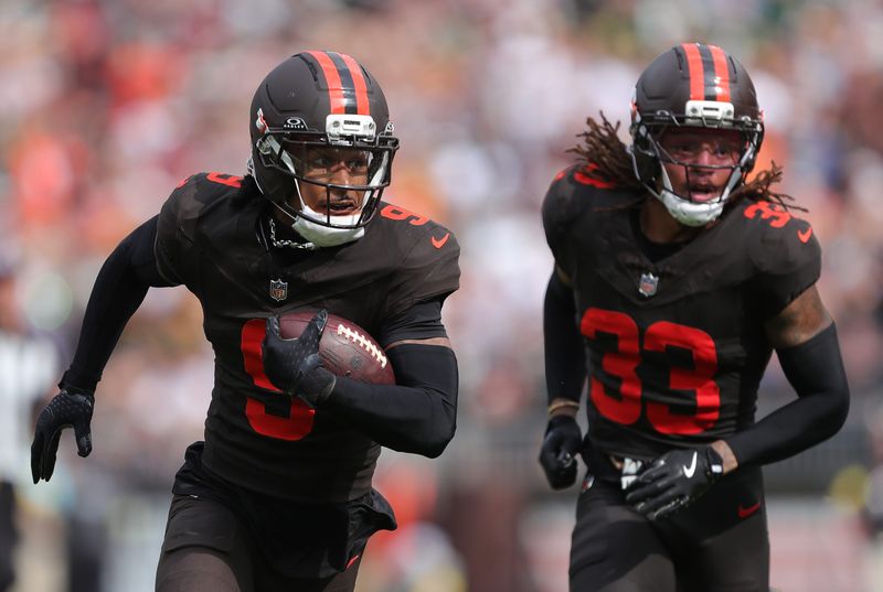 Cleveland Browns safety Grant Delpit (9) runs after an interception during the second half of an NFL football game against the Green Bay Packers at Huntington Bank Field, Sept. 21, 2025, in Cleveland, Ohio.