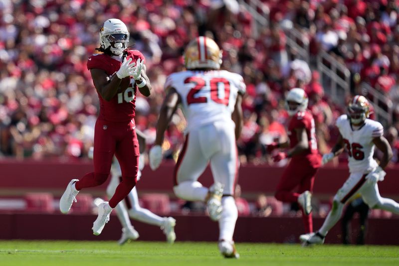 Arizona Cardinals wide receiver Marvin Harrison Jr. (18) drops the pass as San Francisco 49ers cornerback Upton Stout (20) defends during the second half at Levi's Stadium in Santa Clara, California, on Sept. 21, 2025.