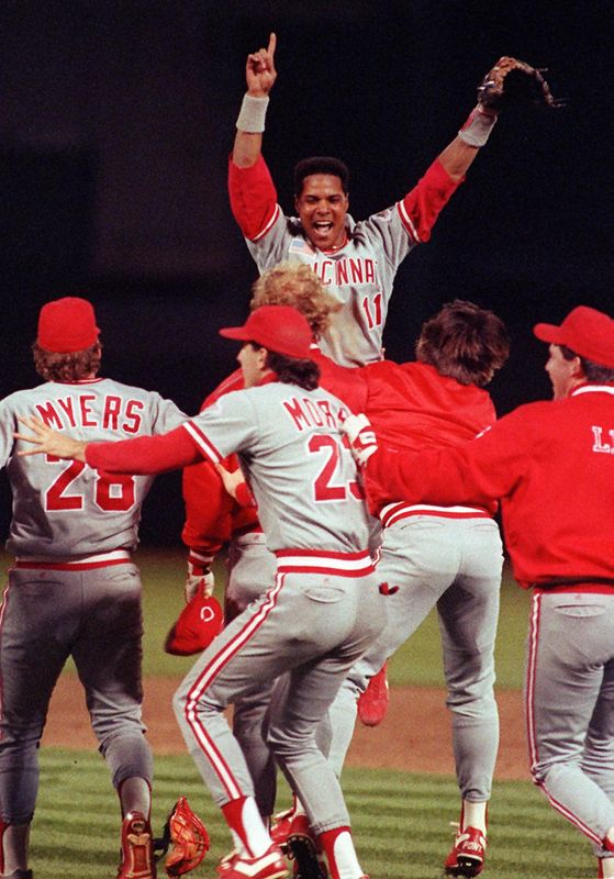 Barry Larkin leaps in celebration after the Reds swept Oakland to win the 1990 World Series.