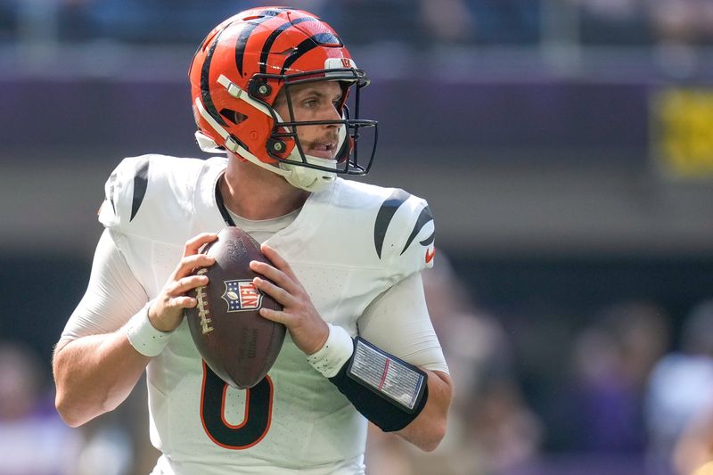 Cincinnati Bengals quarterback Jake Browning (6) drops back to throw in the second quarter of the NFL Week 3 game between the Minnesota Vikings and the Cincinnati Bengals at U.S. Bank Stadium in Minneapolis on Sunday, Sept. 21, 2025.
