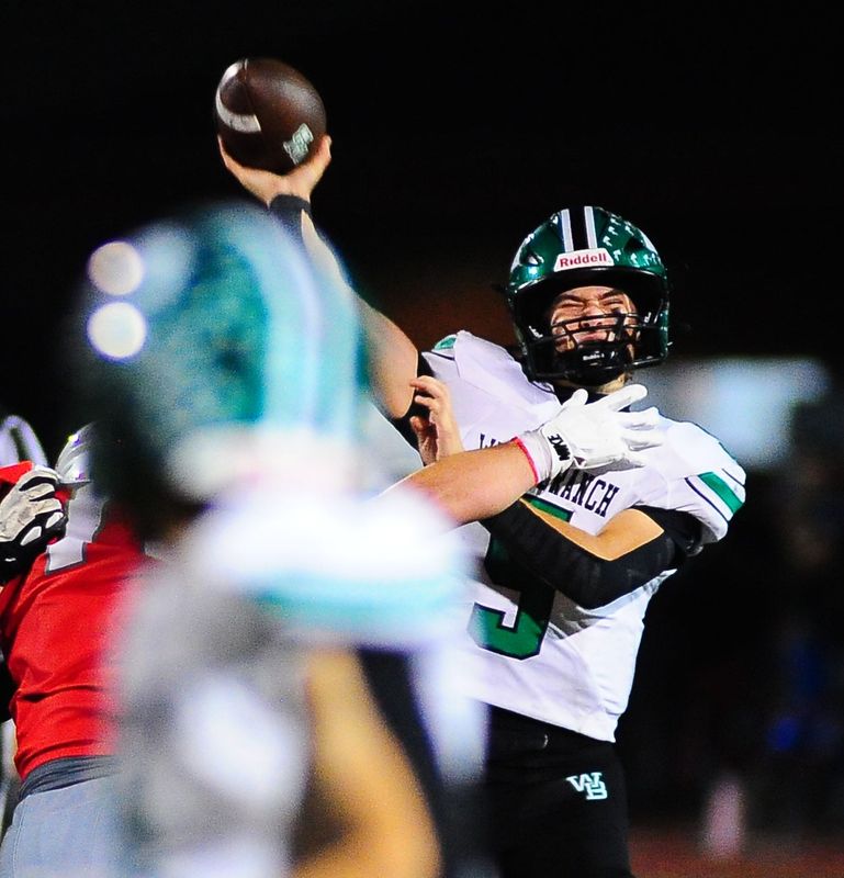 West Branch's Grady Hirst is hit as he throws a pass against Minerva, Friday, Sept. 26, 2025.