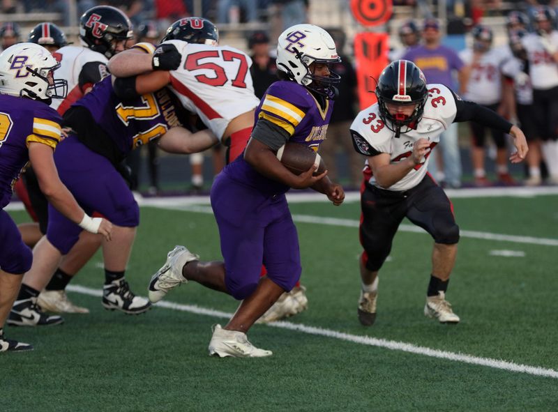 Bloom-Carroll's Kyson Cline (8) runs the ball against Fairifeld Union on Sept. 26, 2025, at Carl Fell Stadium.