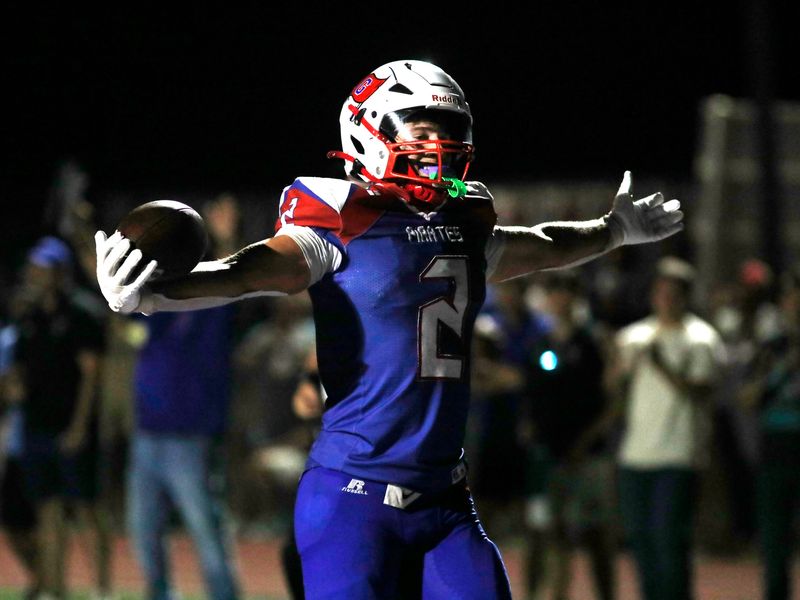 Garaway running back Matthew Frey gestures to the student section after scoring a 12-yard touchdown in the third quarter against visiting Claymont on Friday, Sept. 26, 2025, in Sugarcreek, Ohio. Frey ran for three touchdowns in the second half as the Pirates bounced back from a 49-7 loss at Girard in Week 5.