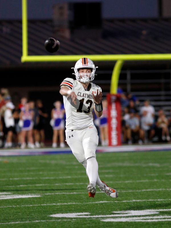 Claymont quarterback Carson Golec throws a pass against Garaway in an Inter-Valley Conference high school football game on Friday Sept. 26, 2025, in Sugarcreek, Ohio. Garaway won, 33-6, to improve to 5-1.