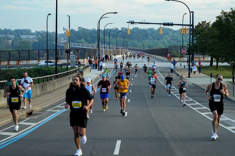 Runners compete in the 2025 Akron Marathon, Sept. 27, 2025, in Akron, Ohio.
