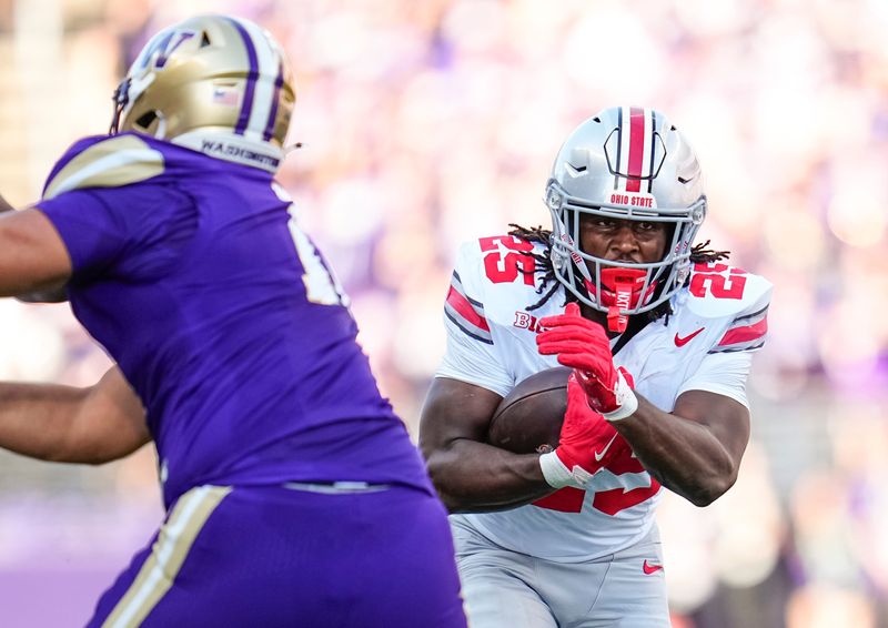 Ohio State Buckeyes running back Bo Jackson (25) runs during the first half of the NCAA football game at Husky Stadium in Seattle on Sept. 27, 2025.