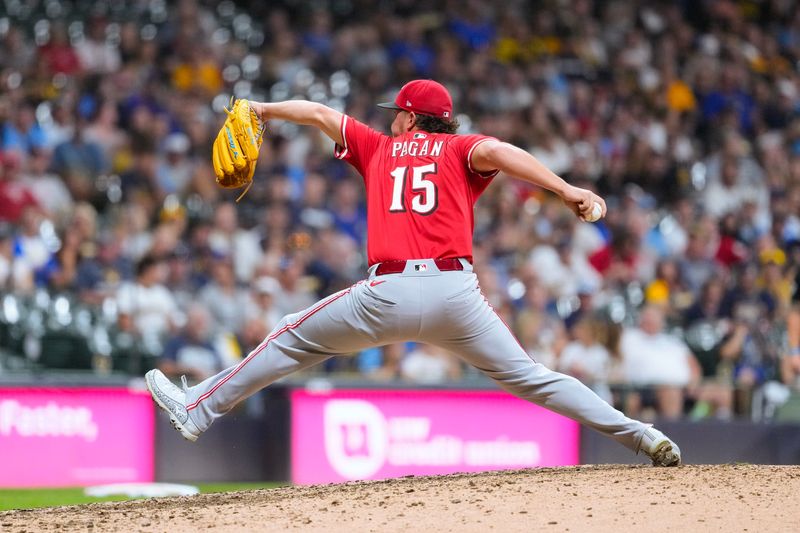 Emilio Pagan recorded his 31st save with a 1-2-3 ninth inning, preserving the Reds' 7-4 victory over the Milwaukee Brewers on Sept. 27.