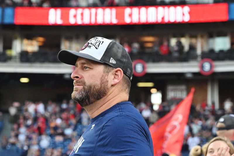 Cleveland Guardians manager Stephen Vogt watches the flag raising after the Guardians beat the Texas Rangers and won the American League Central Division on Sept. 28, 2025, in Cleveland.