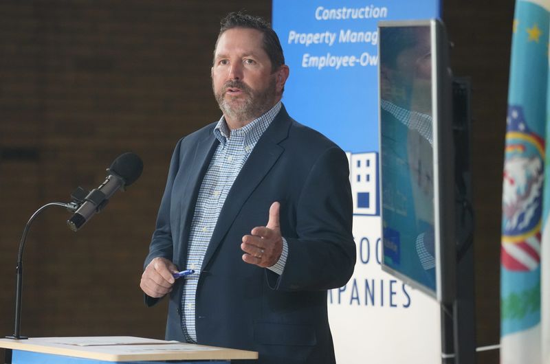 Jeffrey Woda, founder of Woda Cooper Companies, Inc, speaks at the media event announcing the renovation of the downtown YMCA into 121 affordable housing units. The Jacobethan Revival and Late Gothic Revival building, built in 1922, is on the National Register of Historic Places. Residents who lived in the building prior to its decommissioning in 2019 by the YMCA have been moved to other residences. Woda Cooper is the private developer leading the public/private redevelopment.