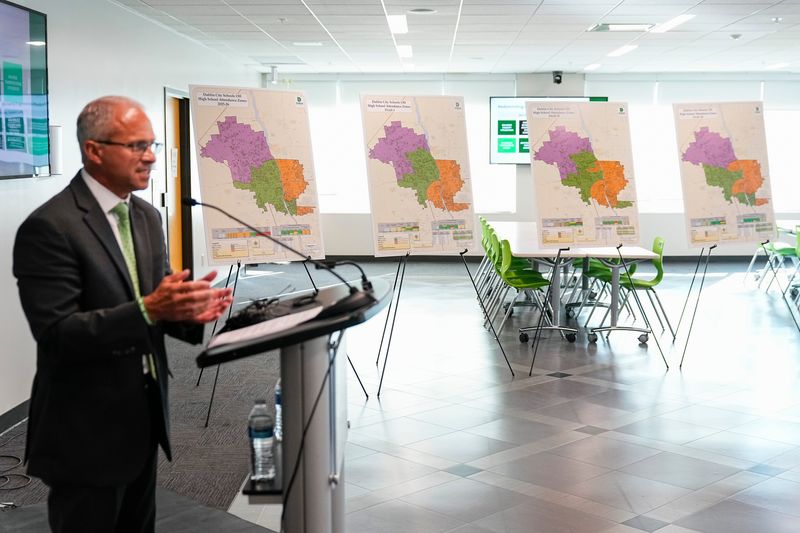 To combat growth in the district without building another high school, Dublin City Schools superintendent John Marschhausen unveils three different map proposals for high school redistricting during a news conference on Sept. 29, 2025. The new boundaries will take effect beginning with the fall 2026 school year.