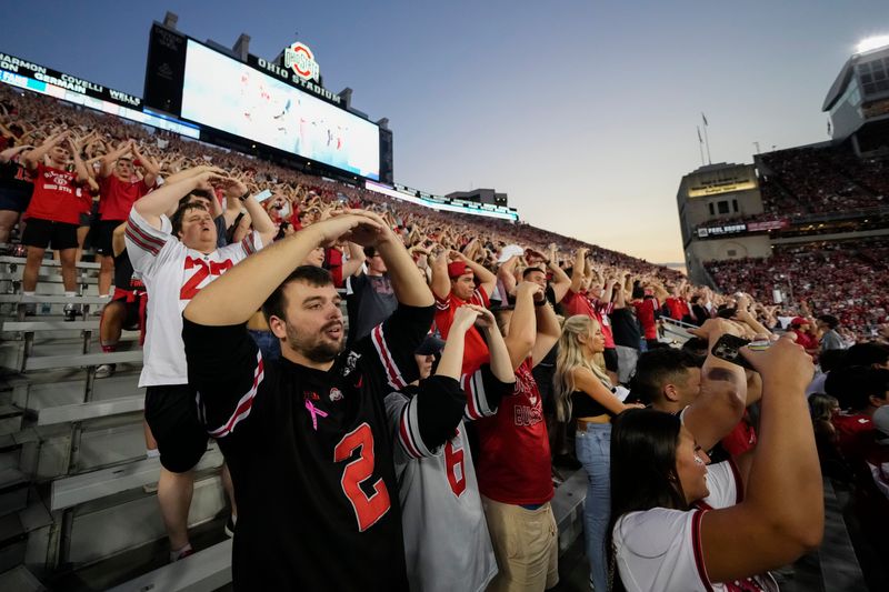 Ohio State students in the south stands cheer prior to the Buckeyes' Oct. 4 game against Minnesota at Ohio Stadium.