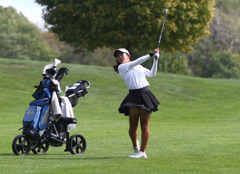 Olentangy's Jodie Han watches her approach shot on No. 12 during the Division I district tournament at the Links at Echo Springs on Oct. 6. Han was tournament medalist with a 9-under par 63.