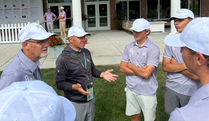 Buckeye Valley boys golf coach Mark Paluszak talks to his team after the opening round of the Division II state tournament Oct. 6 at NCR Country Club in Kettering.