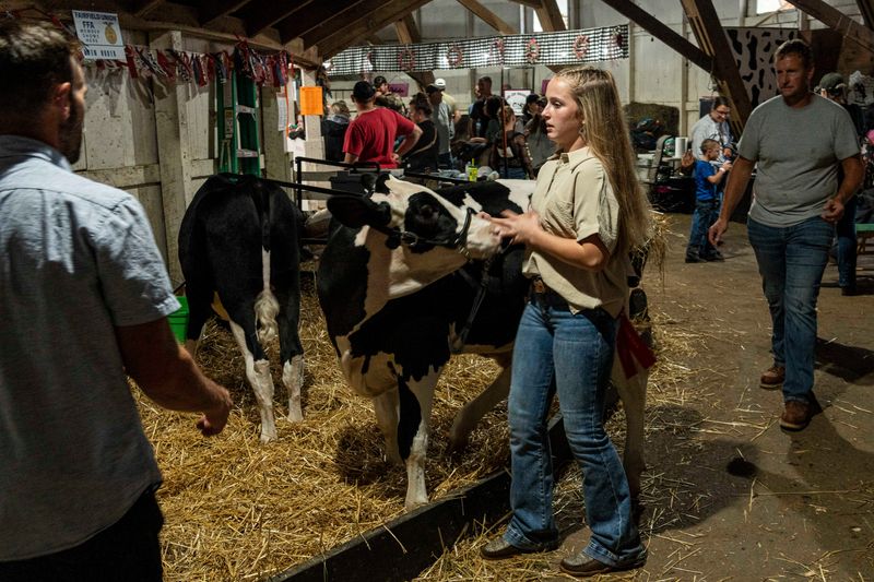 Fairgoers enjoyed the games, animal barns and enjoyed a day at the fair despite the rain and cloudy weather at the Fairfield County Fair on Oct. 7, 2025, in Lancaster, Ohio.