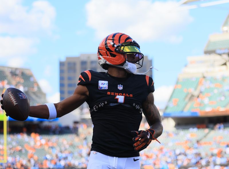 Oct 5, 2025; Cincinnati, Ohio, USA; Cincinnati Bengals wide receiver Ja'Marr Chase (1) warms up before a game against the Detroit Lions at Paycor Stadium. Mandatory Credit: Katie Stratman-Imagn Images