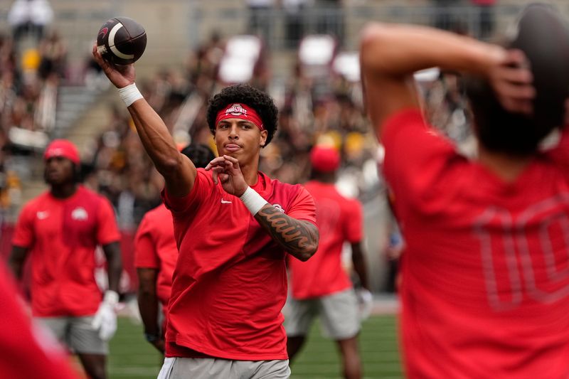 Ohio State Buckeyes quarterback Tavien St. Clair (9) warms up prior to the NCAA football game against the Grambling State Tigers at Ohio Stadium on Sept. 6, 2025.